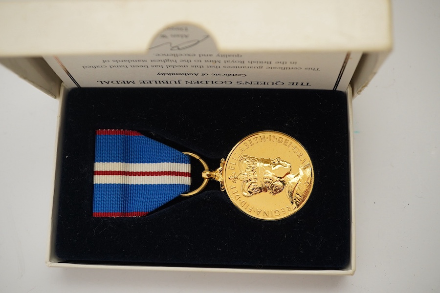 A collection of medal related items, etc., including